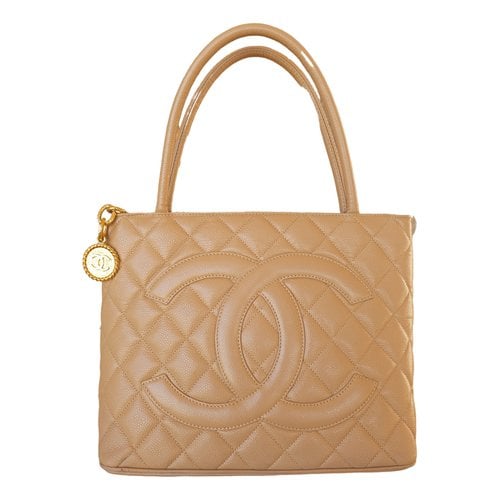 Pre-owned Chanel Médaillon Leather Tote In Beige