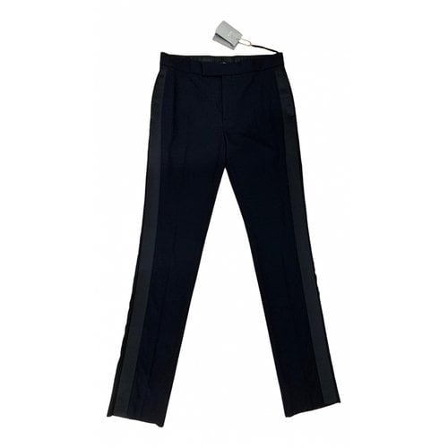 Pre-owned Tom Ford Wool Trousers In Black