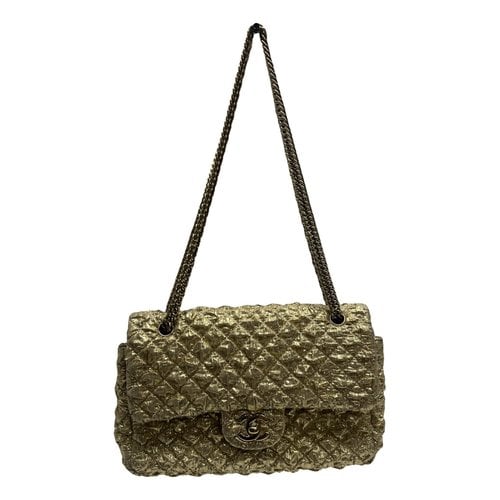 Pre-owned Chanel Timeless/classique Cloth Handbag In Gold