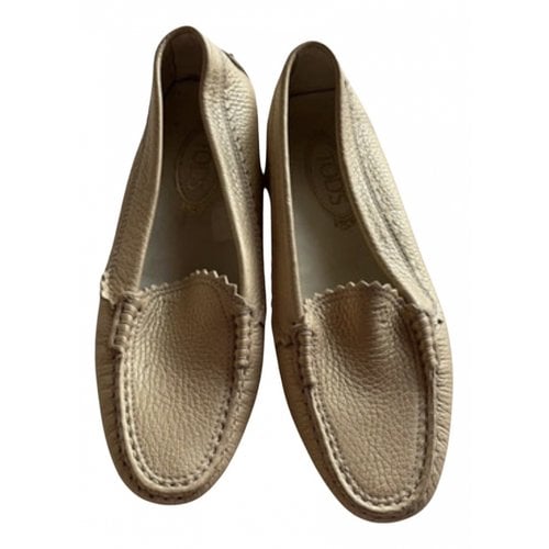 Pre-owned Tod's Leather Flats In Gold
