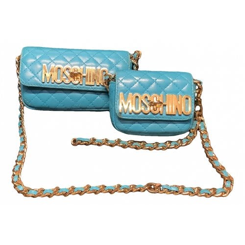 Pre-owned Moschino Leather Clutch Bag In Blue
