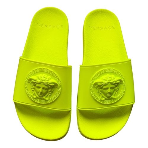 Pre-owned Versace Mules In Yellow