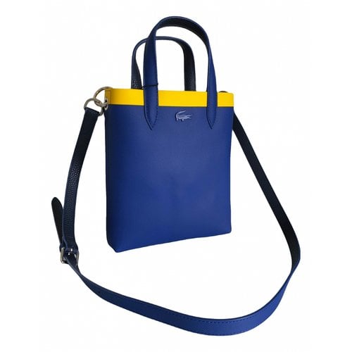 Pre-owned Lacoste Patent Leather Handbag In Blue