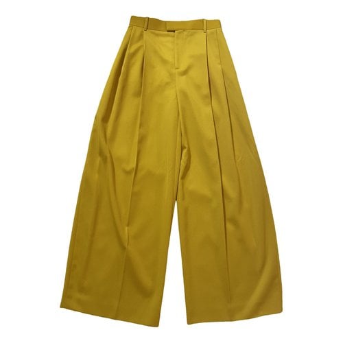 Pre-owned Bottega Veneta Wool Trousers In Yellow