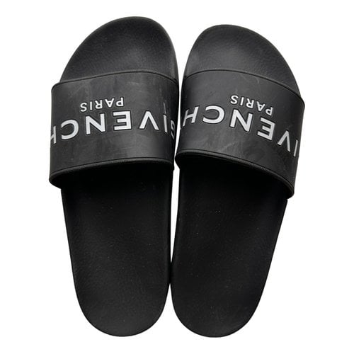 Pre-owned Givenchy Flip Flops In Black