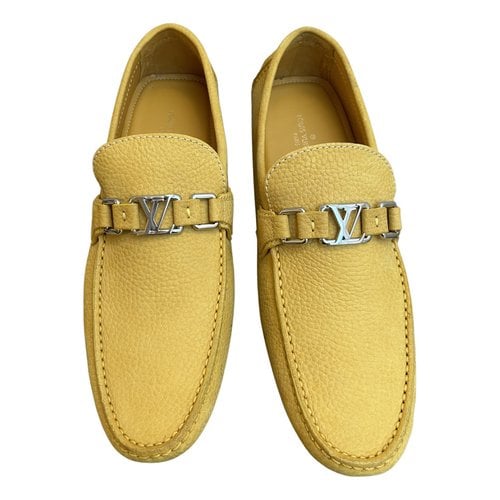 Pre-owned Louis Vuitton Hockenheim Leather Flats In Yellow