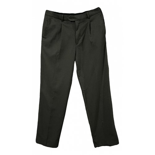 Pre-owned Saint Laurent Wool Trousers In Green