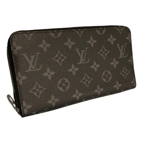 Pre-owned Louis Vuitton Zippy Leather Purse In Black