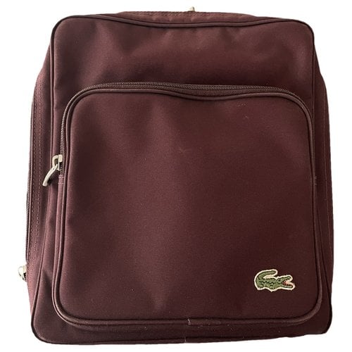 Pre-owned Lacoste Cloth Backpack In Burgundy