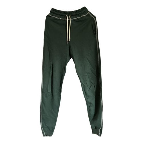 Pre-owned Jw Anderson Trousers In Green