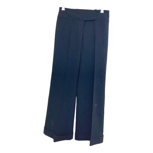Pre-owned Laura Biagiotti Wool Trousers In Black