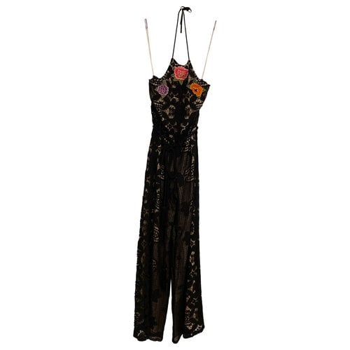 Pre-owned Miguelina Jumpsuit In Black