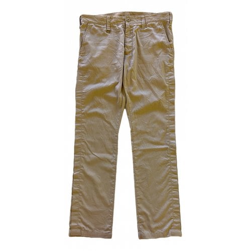Pre-owned Uniform Experiment Trousers In Beige
