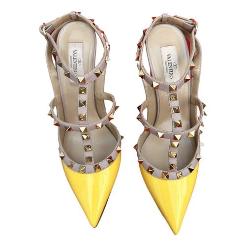 Pre-owned Valentino Garavani Rockstud Patent Leather Heels In Yellow