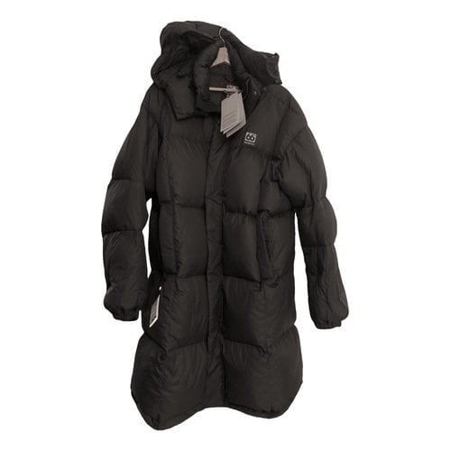 Pre-owned 66 North Puffer In Black