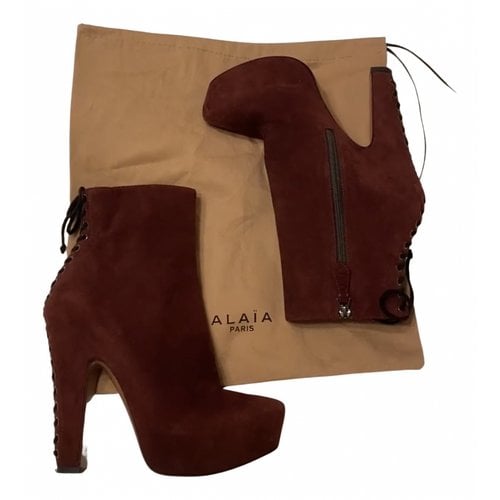 Pre-owned Alaïa Lace Up Boots In Burgundy