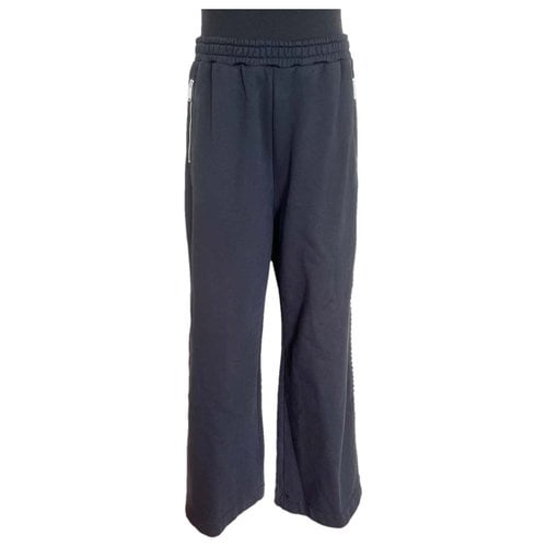 Pre-owned Area Trousers In Black