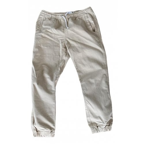 Pre-owned Soulland Trousers In Beige