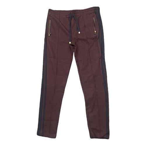 Pre-owned Dolce & Gabbana Trousers In Burgundy