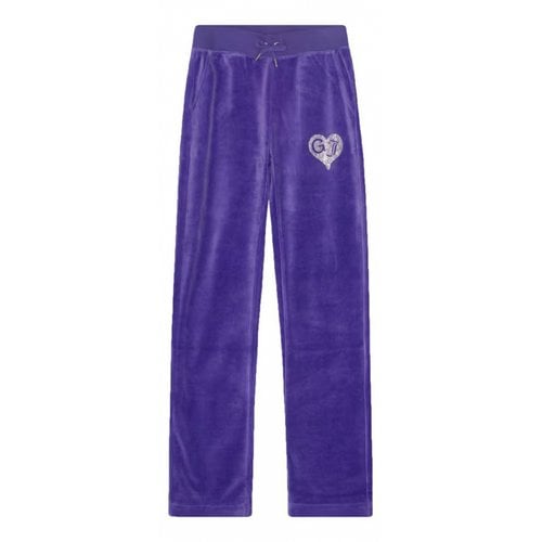 Pre-owned Ganni Trousers In Purple