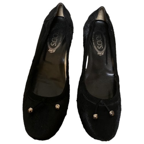 Pre-owned Tod's Pony-style Calfskin Ballet Flats In Black