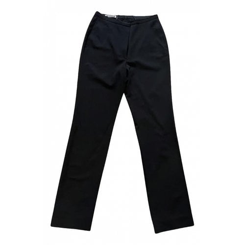 Pre-owned Jil Sander Wool Trousers In Black
