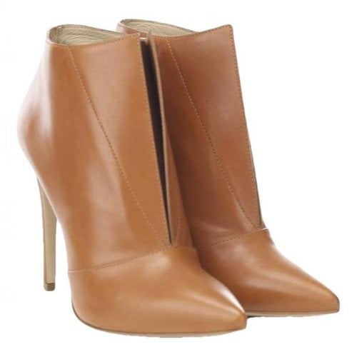 Pre-owned Longchamp Patent Leather Boots In Brown