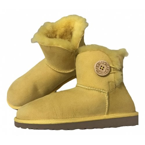 Pre-owned Ugg Snow Boots In Yellow
