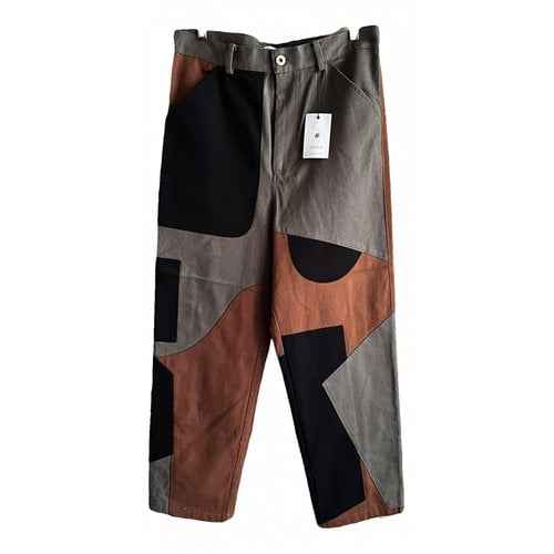 Pre-owned Jw Anderson Trousers In Brown