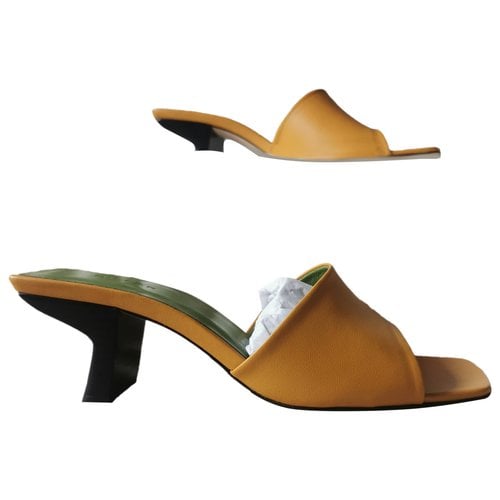 Pre-owned By Far Leather Mules & Clogs In Yellow