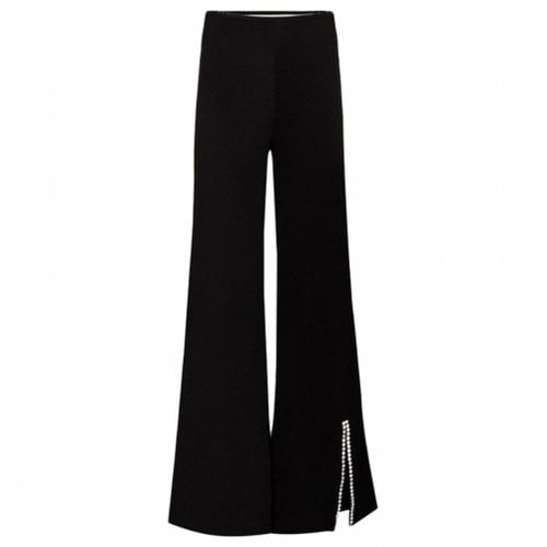 Pre-owned Area Trousers In Black