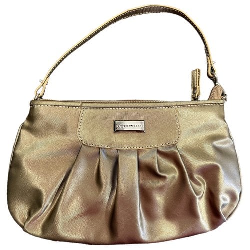Pre-owned Coccinelle Cloth Handbag In Gold