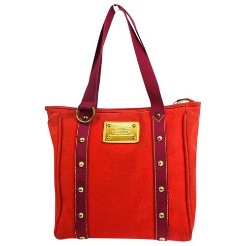 Pre-owned Louis Vuitton Antigua Cloth Handbag In Red