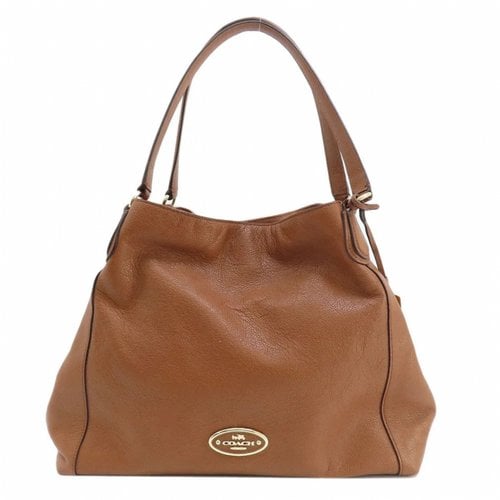 Pre-owned Coach Edie Leather Handbag In Brown
