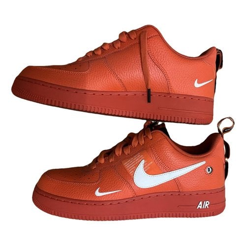 Pre-owned Nike Air Force 1 Leather Low Trainers In Orange