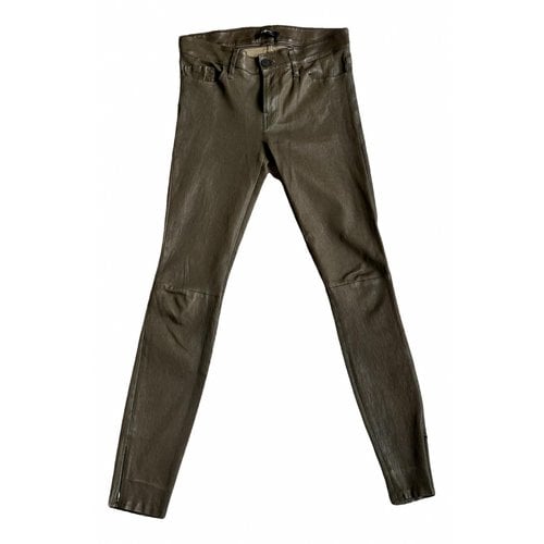 Pre-owned 7 For All Mankind Leather Trousers In Green