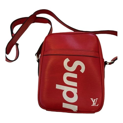 Pre-owned Louis Vuitton X Supreme Leather Travel Bag In Red