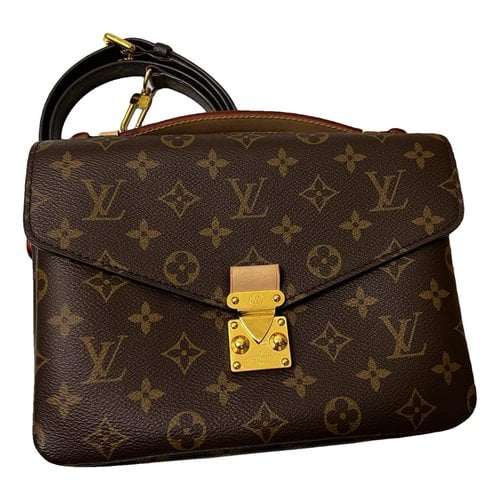 Pre-owned Louis Vuitton Metis Leather Crossbody Bag In Brown