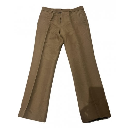 Pre-owned Roberto Cavalli Wool Trousers In Camel