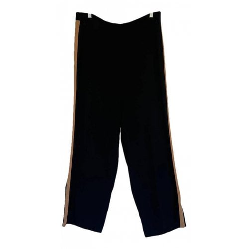 Pre-owned Eileen Fisher Silk Trousers In Black