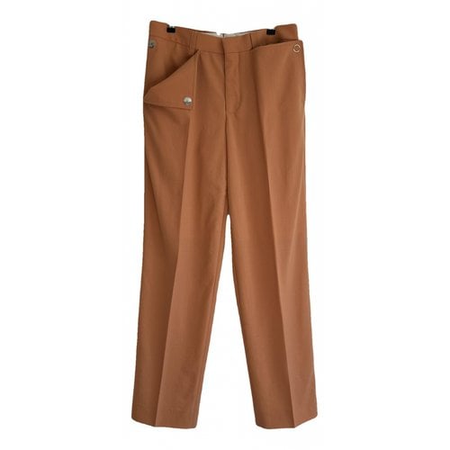 Pre-owned Burberry Wool Trousers In Orange