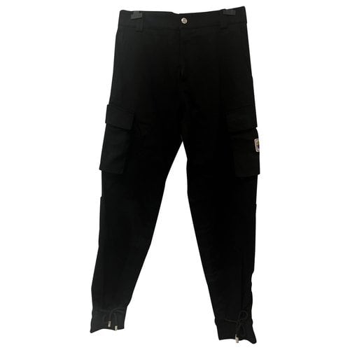 Pre-owned Gcds Trousers In Black