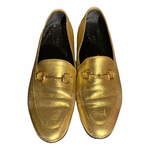 Pre-owned Gucci Brixton Leather Flats In Gold