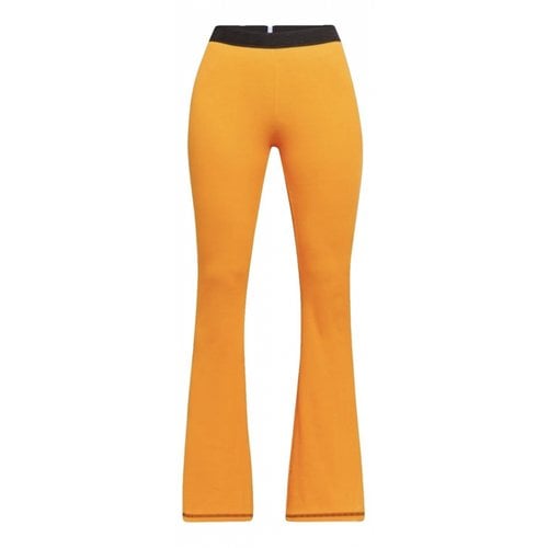 Pre-owned Alexander Mcqueen Trousers In Orange
