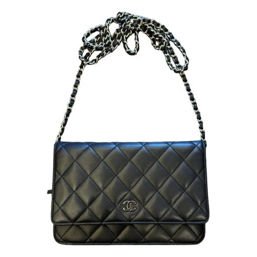 Pre-owned Chanel Wallet On Chain Timeless/classique Leather Crossbody Bag In Black