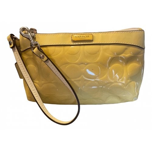 Pre-owned Coach Patent Leather Clutch Bag In Yellow