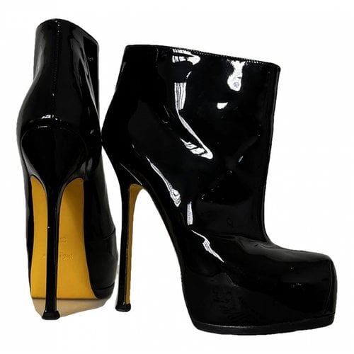 Pre-owned Saint Laurent Patent Leather Boots In Black