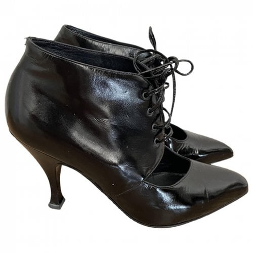 Pre-owned Alaïa Patent Leather Boots In Black