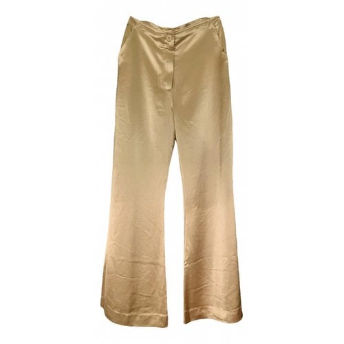 Pre-owned By Malene Birger Trousers In Gold