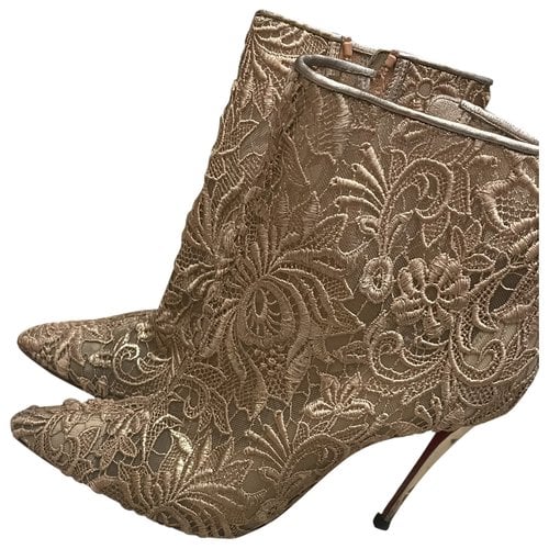 Pre-owned Christian Louboutin Cloth Boots In Gold